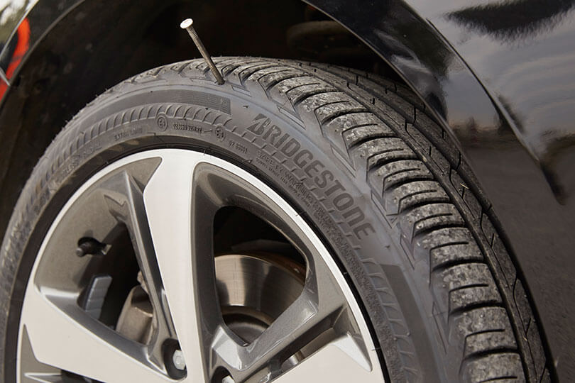 How do you determine car tire pressure?