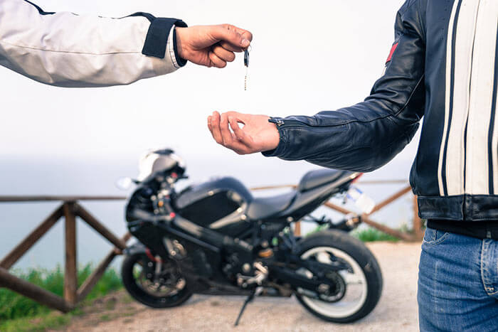 What are the benefits of purchasing a cheap motorcycle?